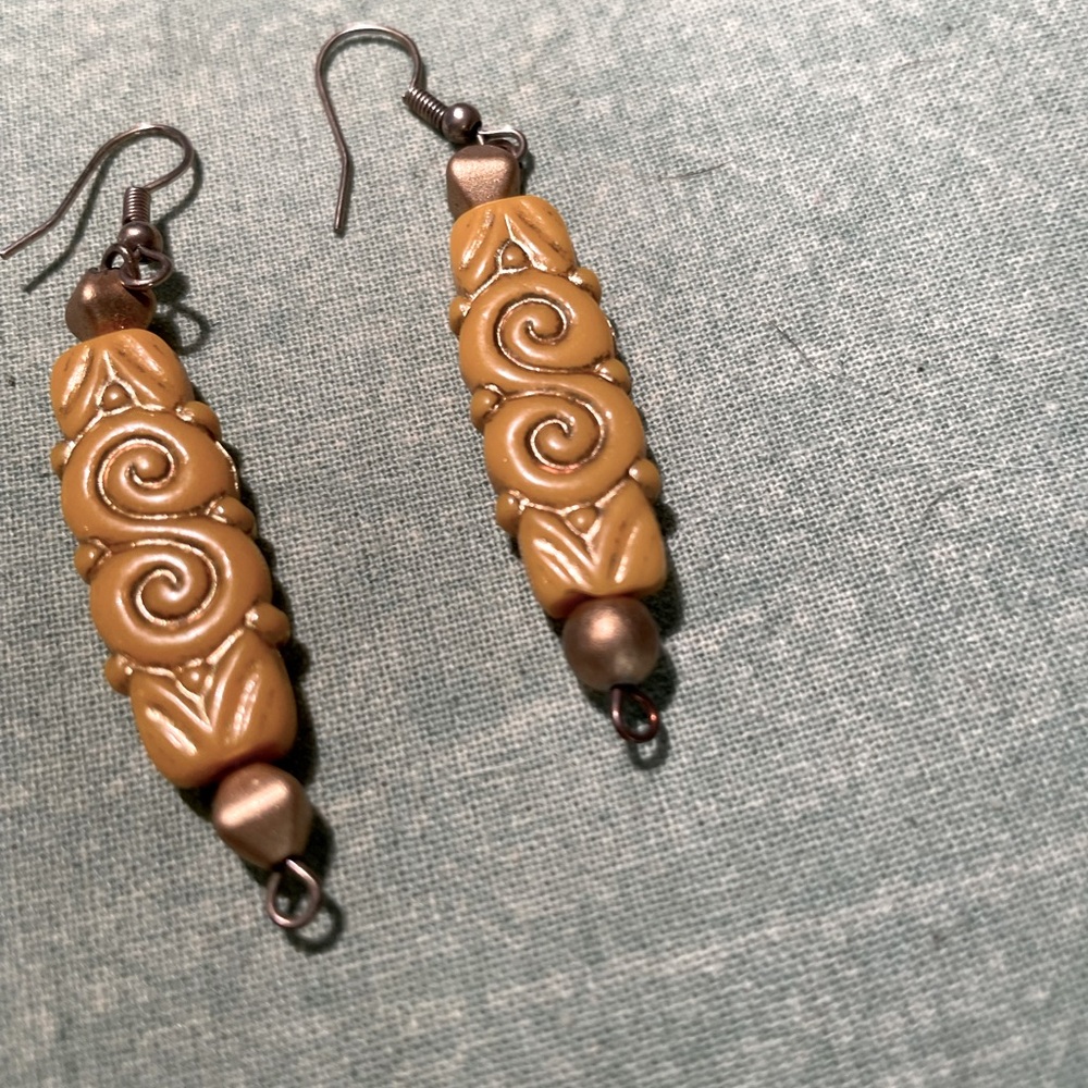 Wood craving look.  Good basic earrings.